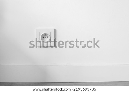 socket on white wall with copyspace, electrical planning, convenient, euro sockets. Power sockets, closeup. Electrical supply, selective focus Royalty-Free Stock Photo #2193693735