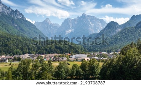 Kranjska Gora town in Slovenia at summer with beautiful nature and mountains in the background Royalty-Free Stock Photo #2193708787