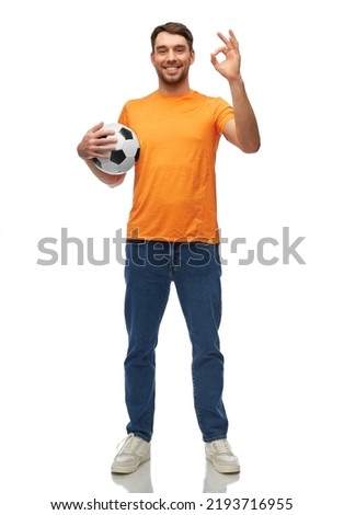 sport, leisure games and people concept - happy smiling man or football fan with soccer ball showing ok hand sign over white background Royalty-Free Stock Photo #2193716955