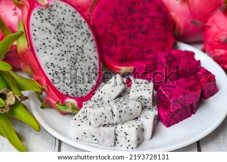 dragon fruit slice on white plate with pitahaya background, fresh white and pink red purple dragon fruit tropical in the asian thailand healthy fruit concept