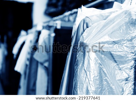 Laundry, hanging on the racks of old clothes. Royalty-Free Stock Photo #219377641
