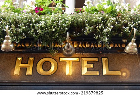 golden hotel sign - close up 