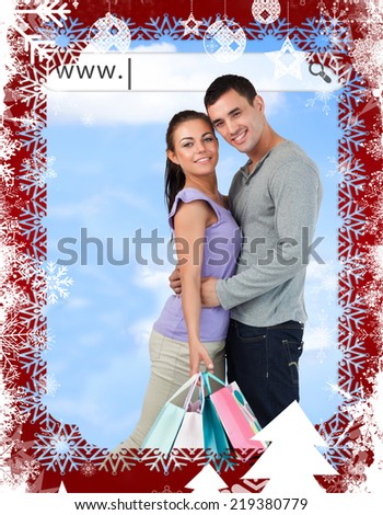 Happy couple with their shopping bags under address bar against christmas themed frame