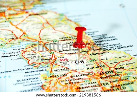 Close up of  United Kingdom  map with red pin - Travel concept Royalty-Free Stock Photo #219381586