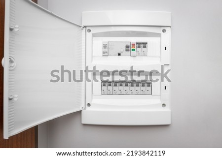 RCD circuit breaker board. Fusebox at the apartment. Voltage switchboard with circuit breakers. Royalty-Free Stock Photo #2193842119
