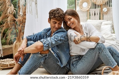 Young attractive cute couple flirting Royalty-Free Stock Photo #2193860359