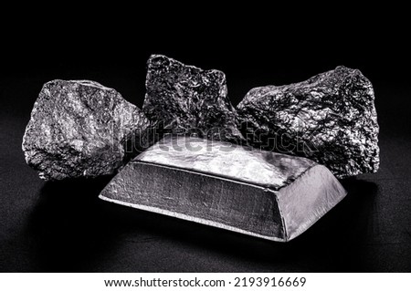 platinum ingot and nugget, noble metal, used in the production of catalysts, luxury jewelry, isolated black background Royalty-Free Stock Photo #2193916669