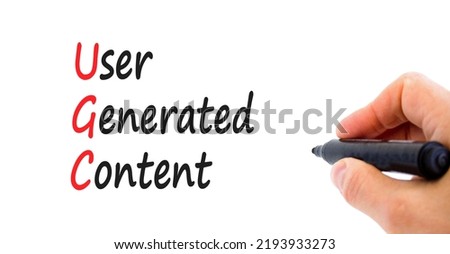 UGC user generated content symbol. Concept words UGC user generated content on a beautiful white background. Businessman hand. Business and UGC user generated content concept. Copy space. Royalty-Free Stock Photo #2193933273