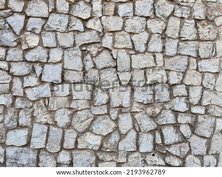 Old stone wall texture background
