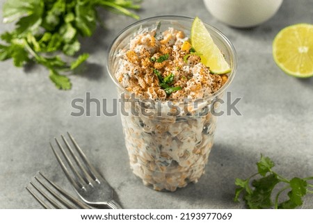 Homemade Corn Elote Esquites in a Cup with Mayo and LIme Royalty-Free Stock Photo #2193977069