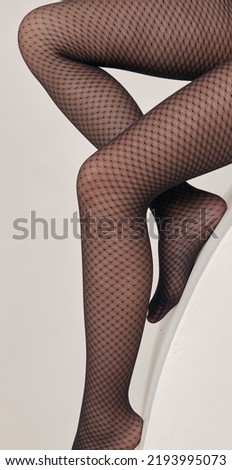 Girl's Legs and Feet Posing and Black Tights