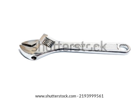 Adjustable wrench isolated in white background. Steel adjustable wrench, equipment, and tool of a worker. Isolation with clipping path.
