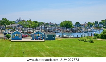 Hyannis Massachusetts Inner Harbor,USA. Photo taken from Michael K. Aselton Memorial Park.With two cute blue sheds. RELEASE ATTACHED. Public property. Royalty-Free Stock Photo #2194029773