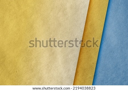 abstract blue and yellow vintage background on old retro paper texture