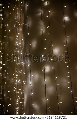Christmas lights. Garland for the new year. vertical photo