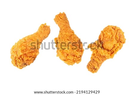 Fried chicken legs isolated on white background. Royalty-Free Stock Photo #2194129429