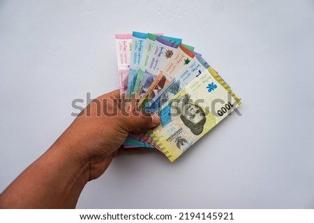 new banknotes issued in 2022 from Rp.1,000 to Rp.100,000. Indonesian rupiah currency Royalty-Free Stock Photo #2194145921
