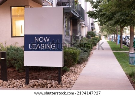 Now leasing sign outside of a nice property