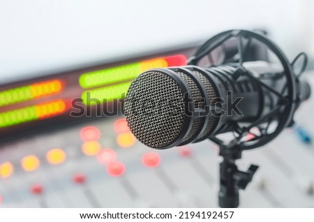 Professional microphone and sound mixer in radio station studio Royalty-Free Stock Photo #2194192457