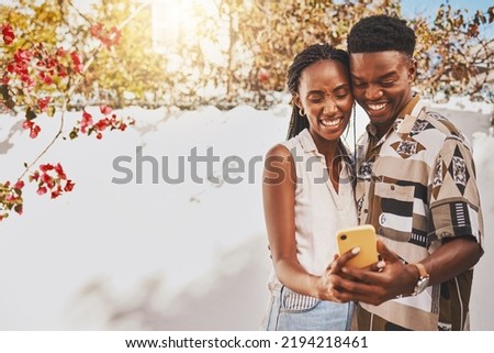 Happy, phone and excited couple taking a selfie outdoors with a smartphone while on vacation or holiday. Joyful lovers on a video call or sharing a picture or a photo online or on social media