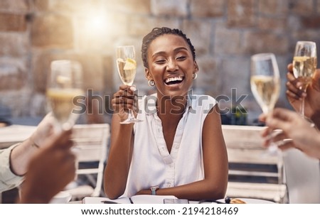 Woman talking for toast with celebration champagne at party with friends, wine for success at restaurant and drinks at social event. Happy black woman with smile and glass at birthday dinner at pub Royalty-Free Stock Photo #2194218469