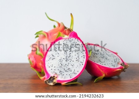 Dragon fruit on wooden table background