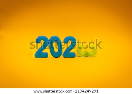 2023 Happy New Year with space copy on yellow background