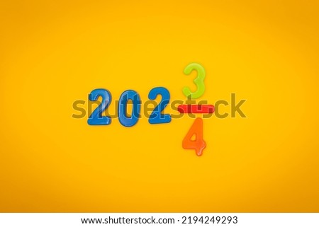 2023 2024 New Year letters with space copy on yellow background