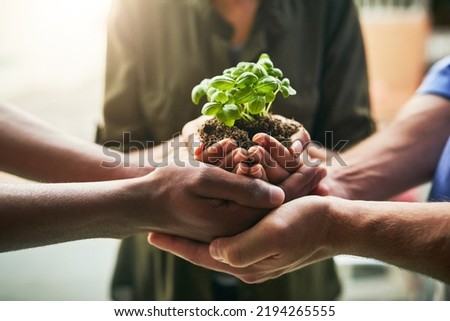Planet, earth and with teamwork our nature environment, green energy and sustainability in a clean community. Global, natural growth and be eco friendly together and reduce carbon footprint to plant Royalty-Free Stock Photo #2194265555