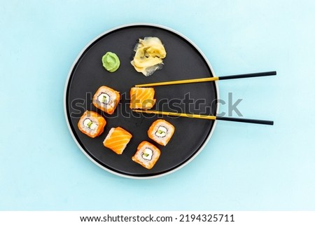 Sushi menu concept. Sushi roll set with salmon on dish