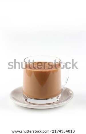 Indian chai in glass cups ,white background. Royalty-Free Stock Photo #2194354813