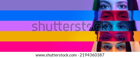 Collage of close-up male and female eyes isolated on colored neon backgorund. Multicolored stripes. Flyer with copy space for ad. Concept of equality, unification of all nations, ages and interests Royalty-Free Stock Photo #2194360387