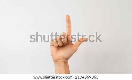 Sign language of the deaf and dumb people, English letter l. High quality photo