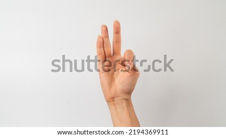 Sign language of the deaf and dumb people, English letter f. High quality photo
