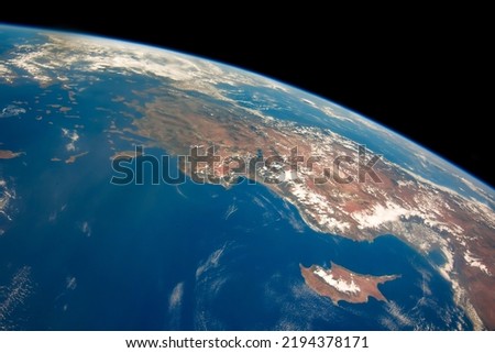 Flat View of Turkey and the island nation of Cyprus is pictured from Space. Detailed physical map of Turkey and Cyprus topography theme. Elements of this image furnished by NASA.