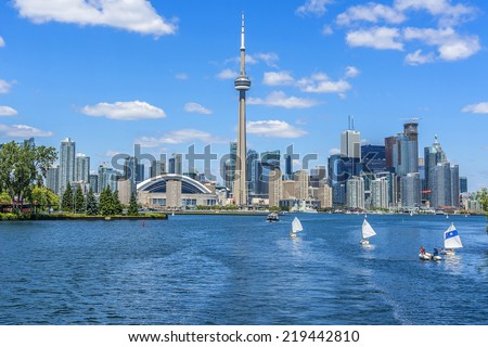 The beautiful Toronto's skyline with CN Tower over lake. Urban architecture. Canada. Royalty-Free Stock Photo #219442810