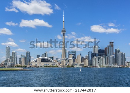 The beautiful Toronto's skyline with CN Tower over lake. Urban architecture. Canada.