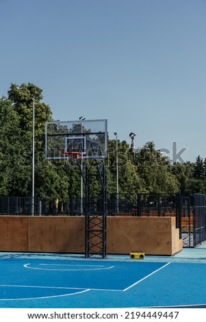modern court with vintage record player under basketball hoop