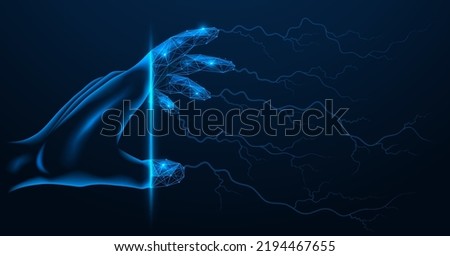 Electric lightning coming from the fingers of the hand.  Polygonal design. Blue background. Royalty-Free Stock Photo #2194467655