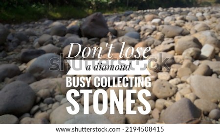 Motivational quote "Don't lose a diamond busy collecting stones". Stones or rocks at riverside.