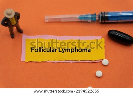 Follicular Lymphoma.The word is written on a slip of colored paper. health terms, health care words, medical terminology. wellness Buzzwords. disease acronyms. Royalty-Free Stock Photo #2194522655