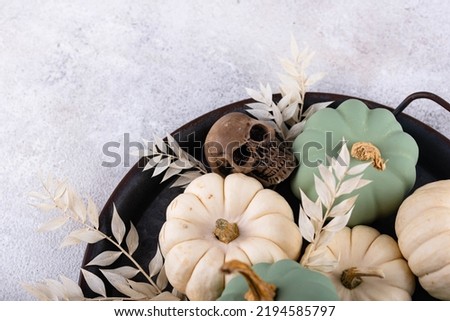 Elegant Halloween with white pumpkin