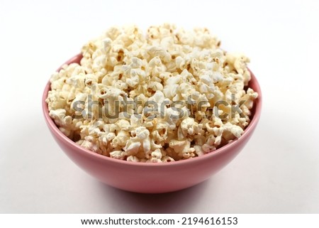 Bowl of popcorn white background.