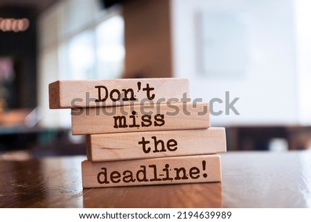Wooden blocks with words 'Don't miss the deadline'. Royalty-Free Stock Photo #2194639989
