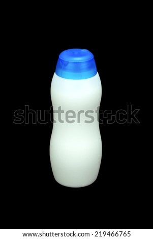 Plastic white bottle  isolated on black