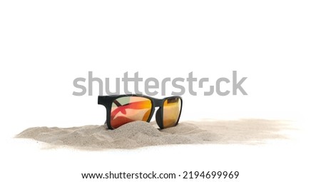 Sand dune and sunglasses isolated on white, clipping path