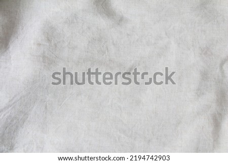 Crumpled fabric texture, cloth background.