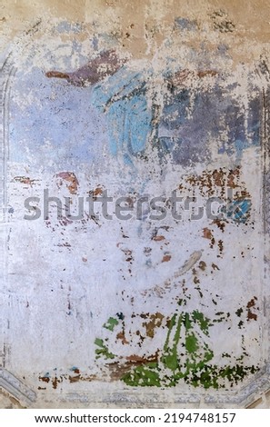 Frescoes on the wall of an abandoned Orthodox church, the church of the village of Spas-Penye, Kostroma region, Russia, June 2022. The year of construction is 1815. Currently abandoned.
