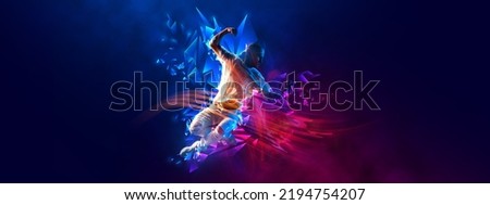 Flyer with young stylish man, breakdanc dancer in motion over dark background with neon colorful elements. Youth culture, movement, street style and fashion, action.