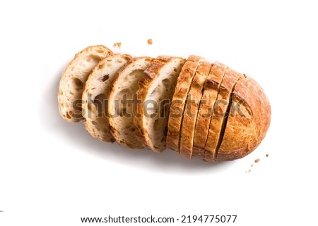 Fresh homebaked artisan sourdough bread. Sliced loaf of bread isolated on white background, design element. Royalty-Free Stock Photo #2194775077